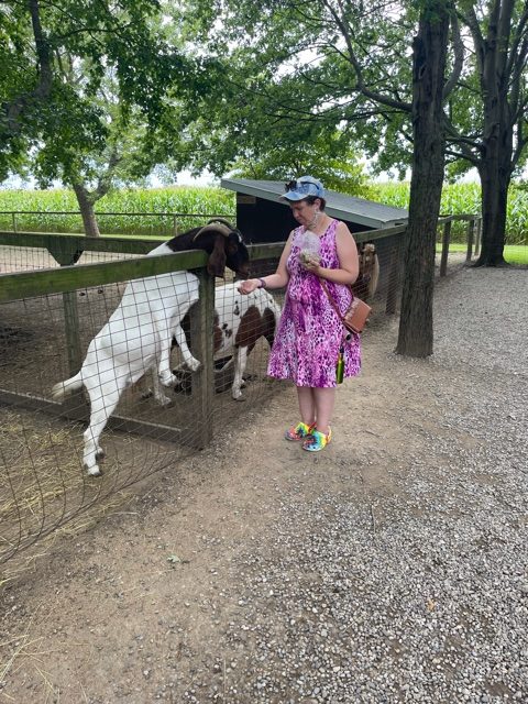 woman at petting zoo