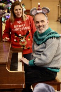 playing piano with a smile.