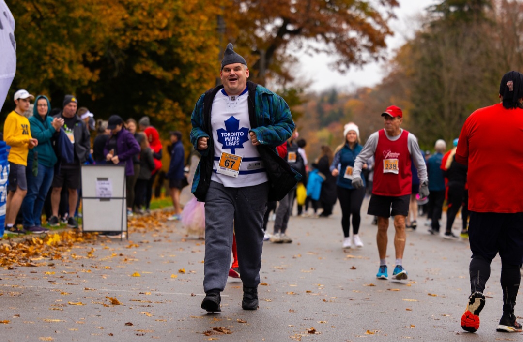 A picture of a Forward House of London member running.